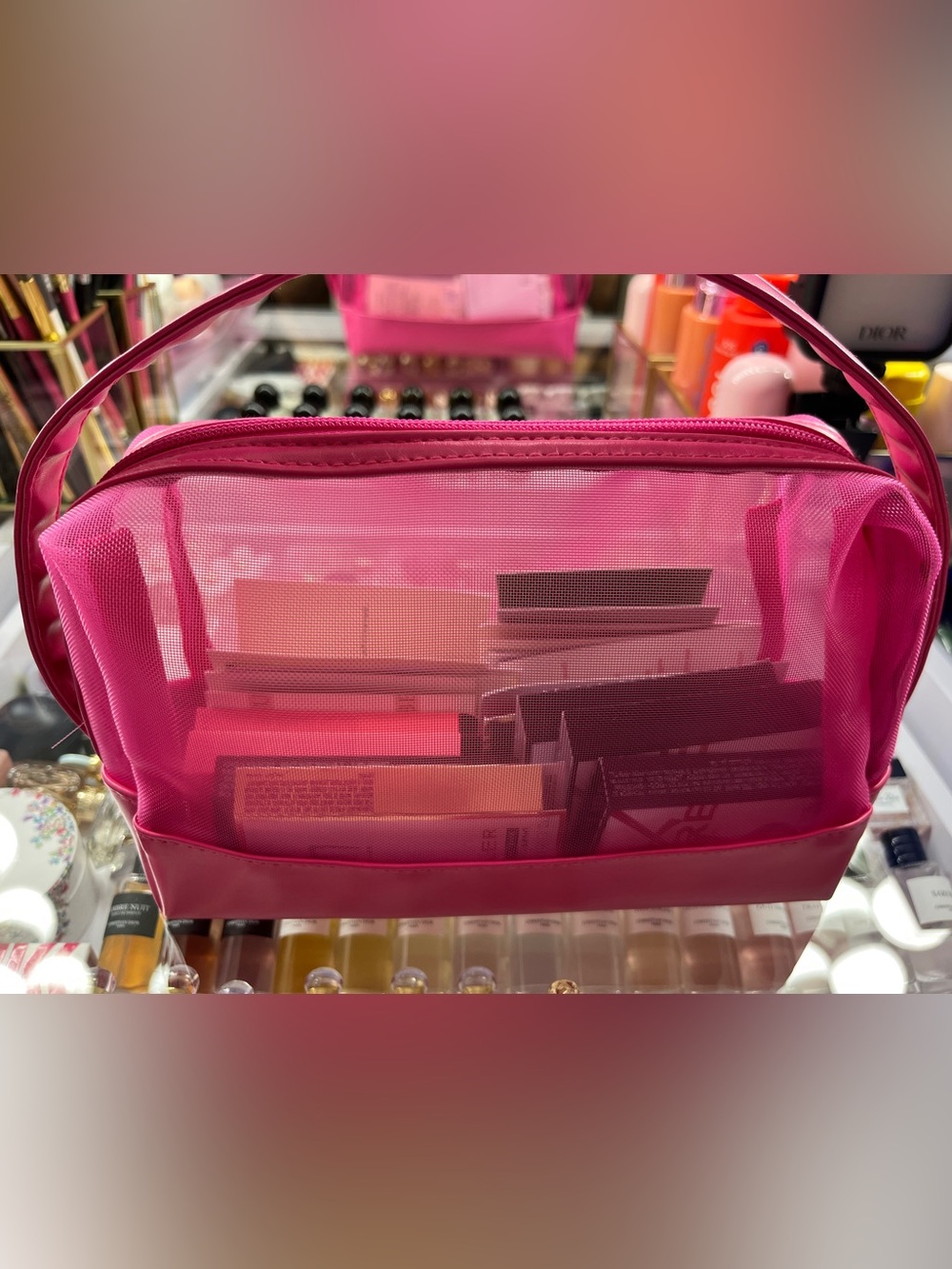 Pink Mesh Cosmetic Organizer Bag - Unbranded with some goodies inside